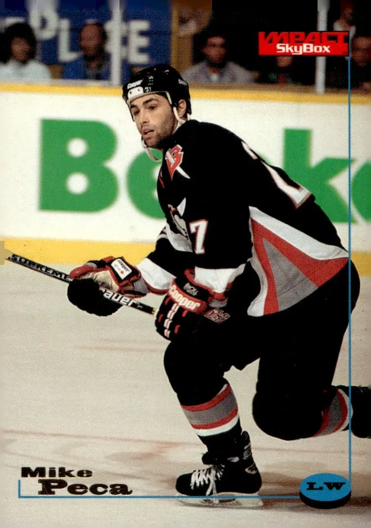 1996-97 SkyBox Impact #12 Mike Peca (front)